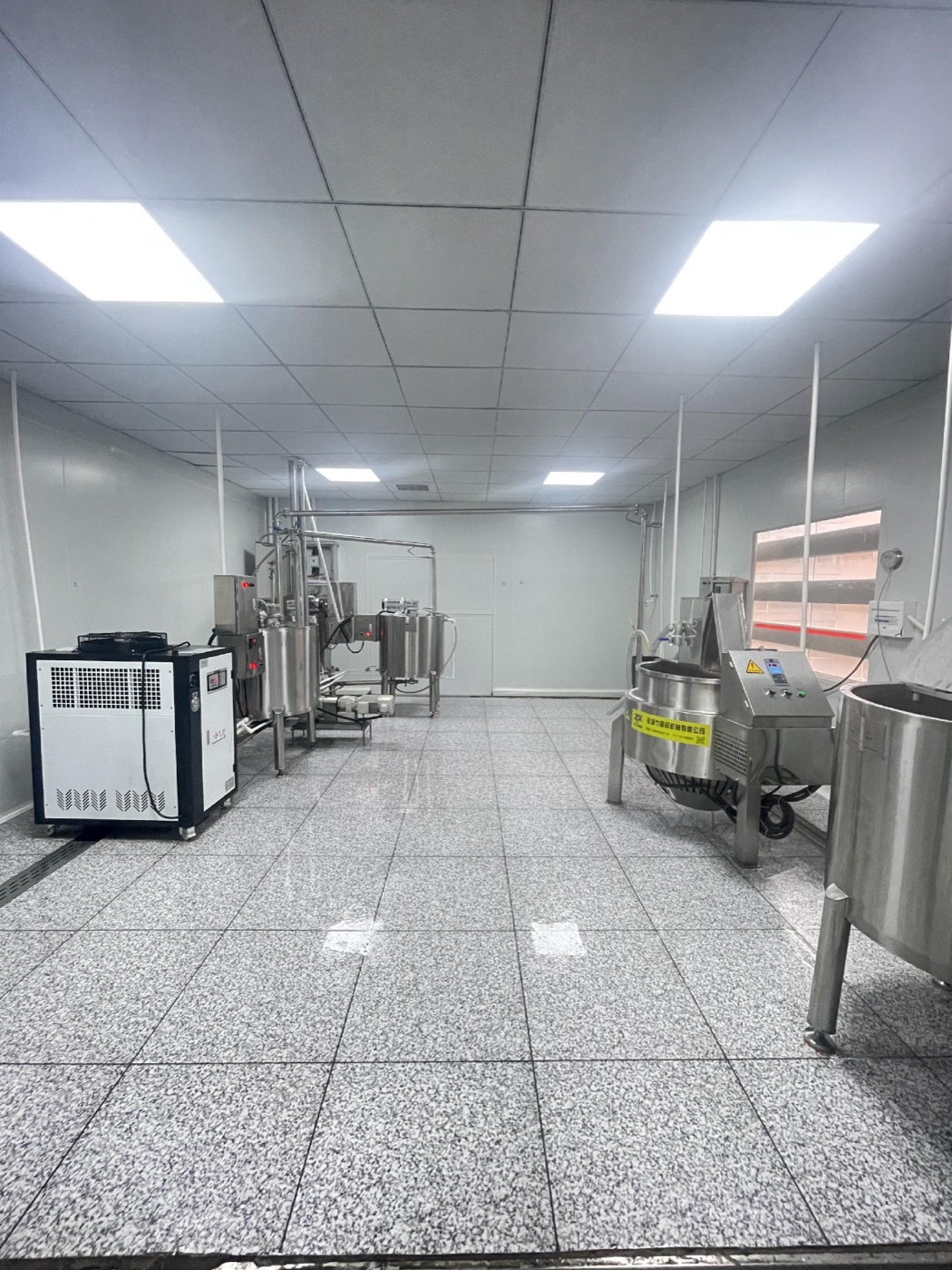 Stainless steel mixing and processing line in candy factory